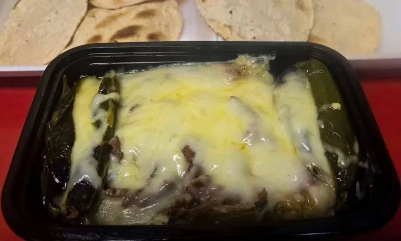 Papa asada con carne